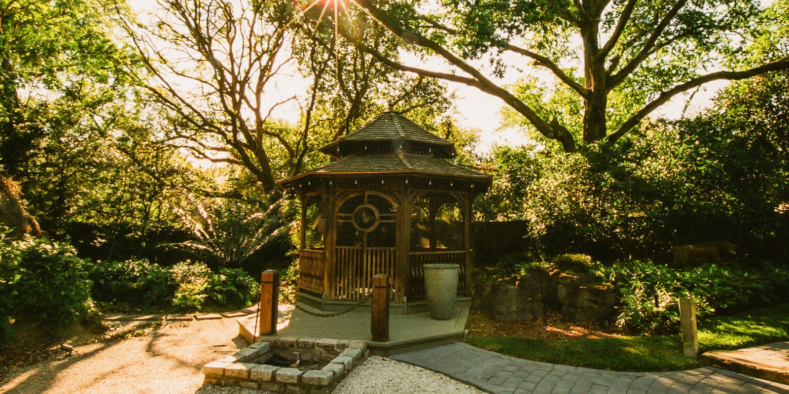 Sunlit gazebo and gardens at the Center Street retreat venue